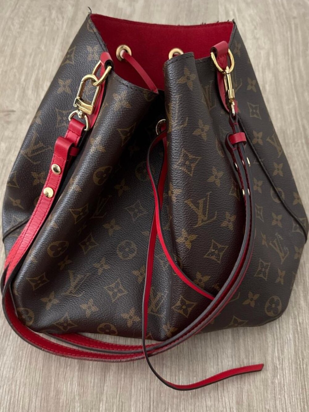 Neonoe red and brown monogram bucket bag